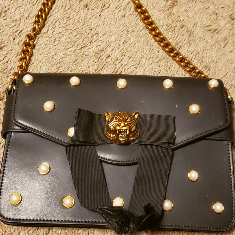 Gucci Animalier purse and a Chanel purse/bag